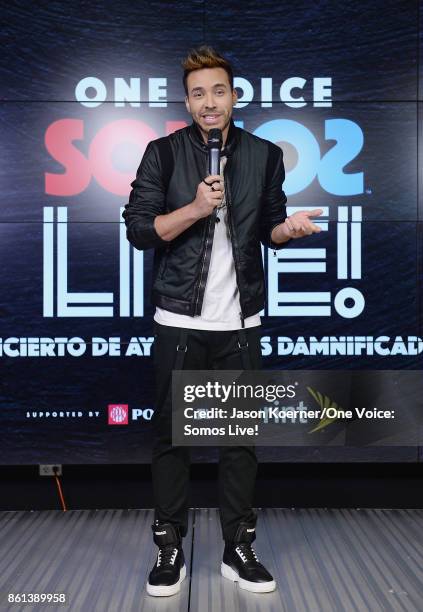 In this handout photo provided by One Voice: Somos Live!, Prince Royce poses in the pressroom at One Voice: Somos Live! A Concert For Disaster Relief...