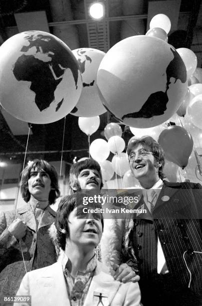 From left, George Harrison , Paul McCartney, Ringo Starr and John Lennon of English rock and pop group The Beatles pose together during a press call...