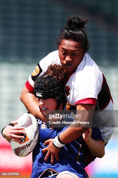 Tofa Cristo of North Harbour tackles Kate Smith of Otago during the round seven Farah Palmer Cup match between North Harbour and Otago at QBE Stadium...
