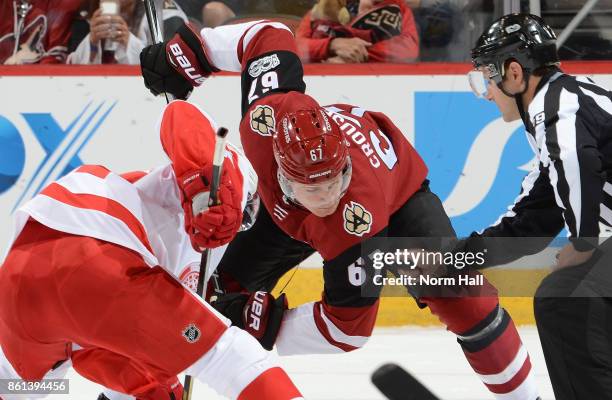 Lawson Crouse of the Arizona Coyotes takes a faceoff against the Detroit Red Wings at Gila River Arena on October 12, 2017 in Glendale, Arizona.