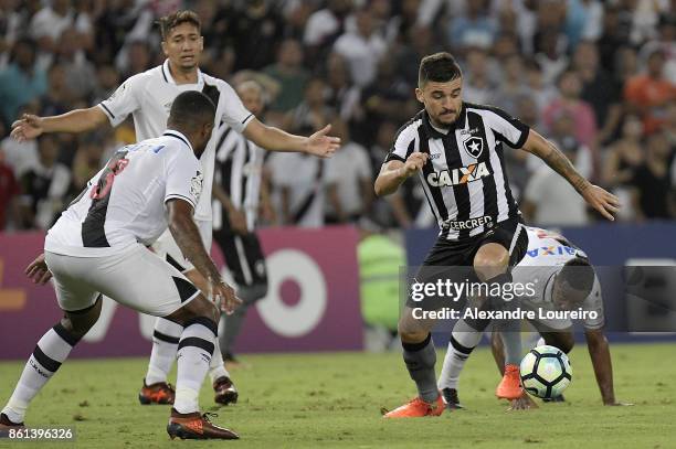 Victor LuisÂ of Botafogo runs with the ball during the match between Vasco da Gama and Botafogo as part of Brasileirao Series A 2017 at Maracana...