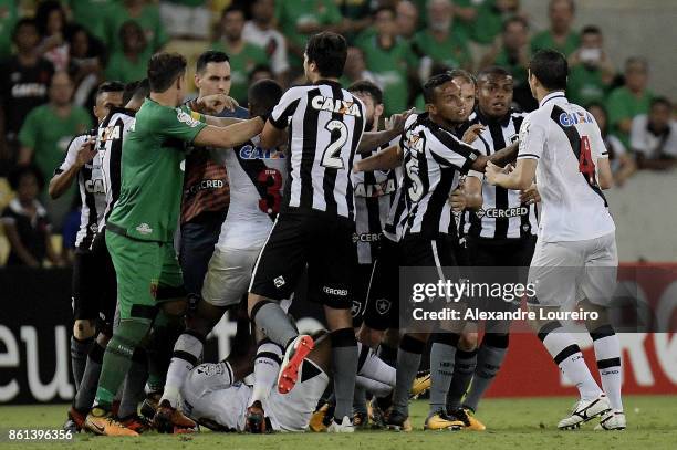 Players of Vasco da Gama and Botafogo fight each other during the match between Vasco da Gama and Botafogo as part of Brasileirao Series A 2017 at...