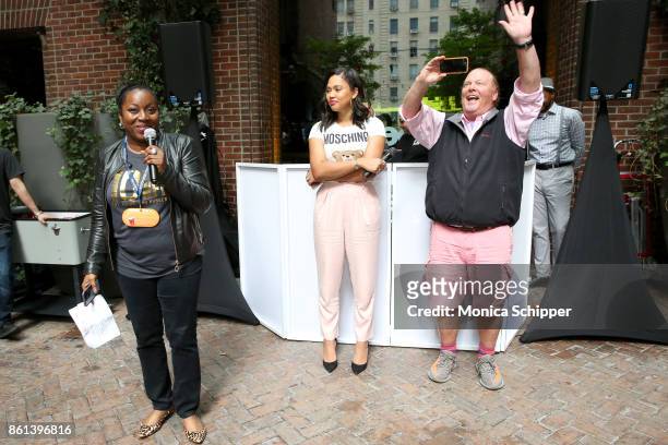 Of Food Bank Margarett Purvis, Television Personality Ayesha Curry and Chef Mario Batali speak during Family Ice Cream Fun-dae hosted by Mario Batali...