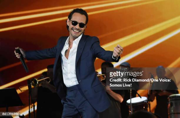 In this handout photo provided by One Voice: Somos Live!, Marc Anthony performs onstage at One Voice: Somos Live! A Concert For Disaster Relief at...