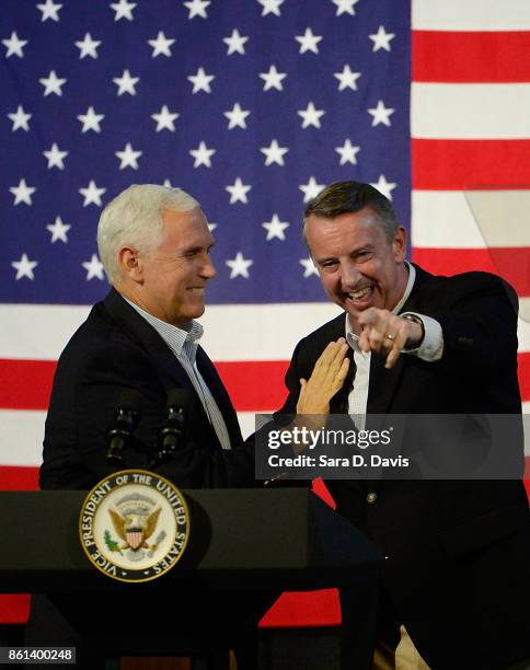 Vice President Mike Pence, left, gubernatorial candidate Ed Gillespie, R-VA, after a campaign rally at the Washington County Fairgrounds on October...