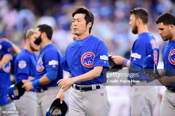 Koji Uehara of the Chicago Cubs looks on prior to Game One of the National League Championship Series against the Los Angeles Dodgers at Dodger...