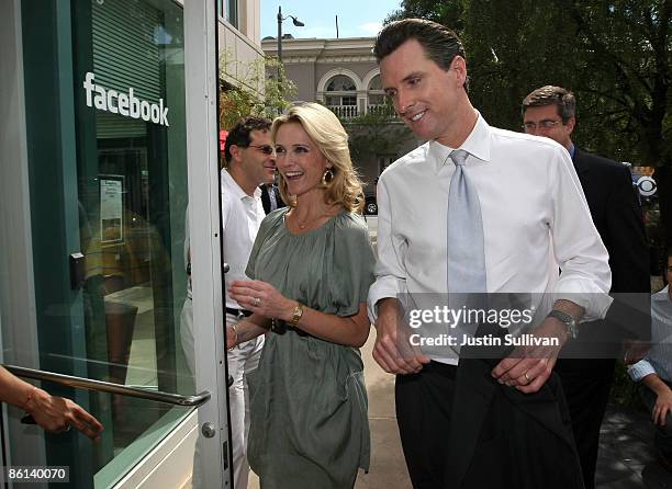 San Francisco Mayor Gavin Newsom and his wife Jennifer Siebel arrive at the Facebook headquarters April 21, 2009 in Palo Alto, California. San...