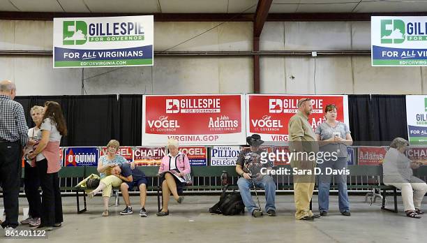 Supporters wait prior a campaign rally for gubernatorial candidate Ed Gillespie, R-VA, where U.S. Vice President Mike Pence will attend at the...