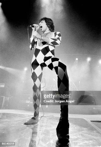 Photo of Freddie MERCURY and QUEEN; Freddie Mercury performing live on stage at Broendby Hall