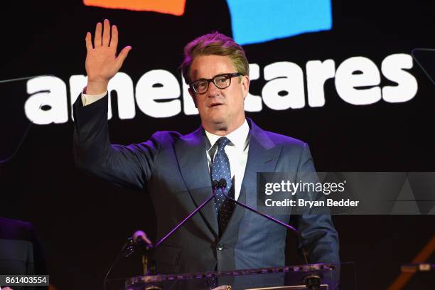 Co-host Joe Scarborough speaks onstage during the 2017 Americares Airlift Benefit at Westchester County Airport on October 14, 2017 in Armonk, New...