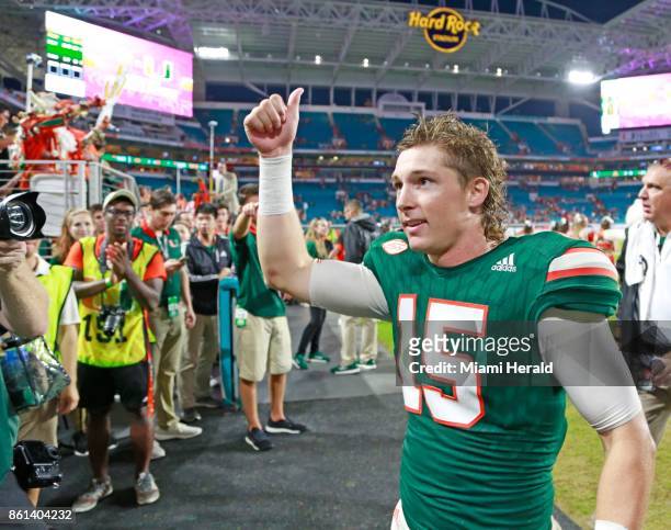 Miami place kicker Michael Badgley gives a thumbs-up to fans after his 24-yard game-winning field goal with four second remaining in the fourth...
