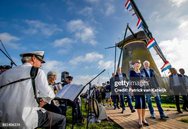 Princess Beatrix of The Netherlands opens the renovated windmill Googermolen on October 14, 2017 in Roelofarendsveen, Netherlands.
