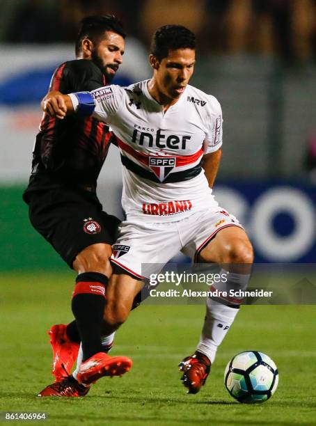 Guilherme of Atletico PR and Hernanes of Sao Paulo in action during the match between Sao Paulo v Atletico PR for the Brasileirao Series A 2017 at...