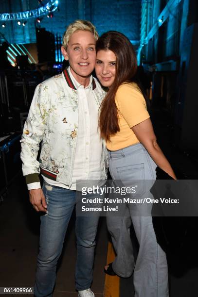 In this handout photo provided by One Voice: Somos Live!, tv personality Ellen DeGeneres and actor Marisa Tomei pose backstage during "One Voice:...