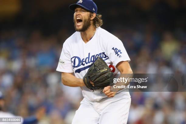 Clayton Kershaw of the Los Angeles Dodgers reacts during the fourth inning of Game One of the National League Championship Series at Dodger Stadium...