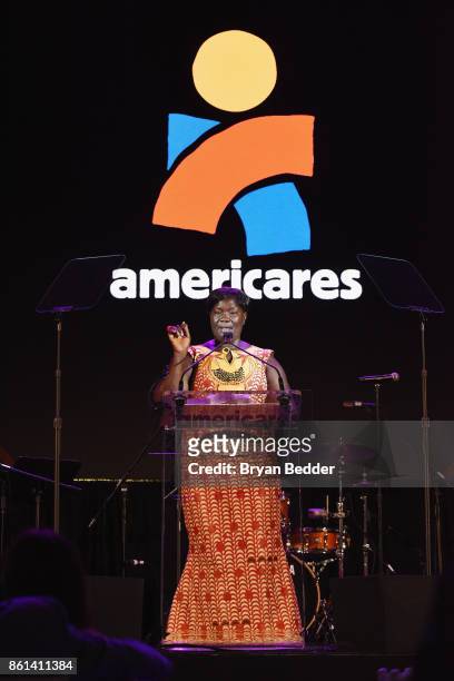 Magdelene Gbatoe Garsuah speaks onstage during the 2017 Americares Airlift Benefit at Westchester County Airport on October 14, 2017 in Armonk, New...