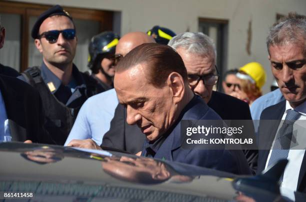 Silvio Berlusconi visits the red zone of the area affected by the earthquake in Ischia, southern Italy, before the convention of Forza Italia.