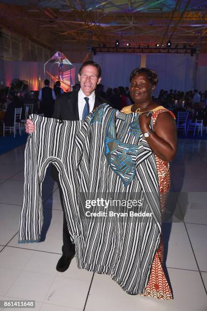 Senator Richard Blumenthal and Magdelene Gbatoe Garsuah attends the 2017 Americares Airlift Benefit at Westchester County Airport on October 14, 2017...