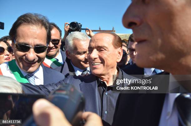 Silvio Berlusconi visits the red zone of the area affected by the earthquake in Ischia, southern Italy, before the convention of Forza Italia.