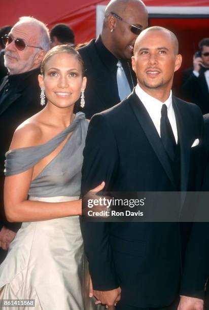 Actress and singer Jennifer Lopez and boyfriend Chris Judd pose for a portrait during The 73rd Annual Academy Awards - Arrivals on March 25, 2001 at...