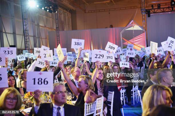 Guests attend the 2017 Americares Airlift Benefit at Westchester County Airport on October 14, 2017 in Armonk, New York.