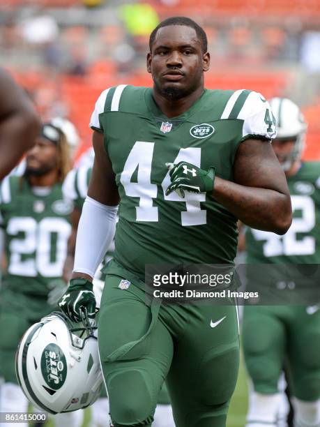 Fullback Lawrence Thomas of the New York Jets runs off the field prior to a game on October 8, 2017 against the Cleveland Browns at FirstEnergy...