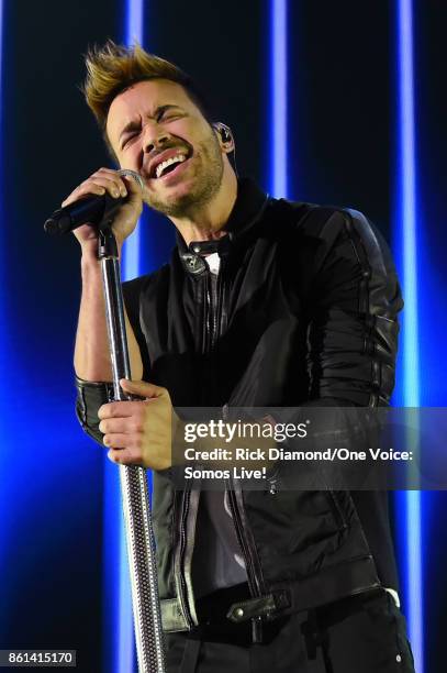 In this handout photo provided by One Voice: Somos Live!, Prince Royce performs onstage at One Voice: Somos Live! A Concert For Disaster Relief at...