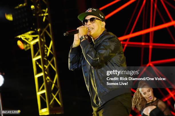 In this handout photo provided by One Voice: Somos Live!, Daddy Yankee performs onstage at One Voice: Somos Live! A Concert For Disaster Relief at...