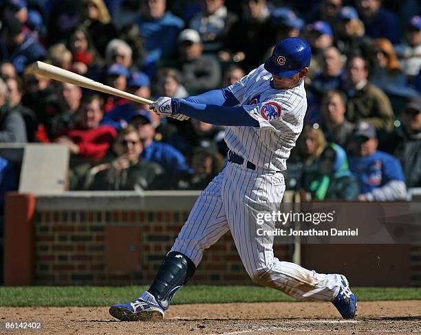 Kosuke Fukudome of the Chicago Cubs, wearing a jersey on Jackie Robinson Day, swings the bat against the Colorado Rockies on April 15, 2009 at...