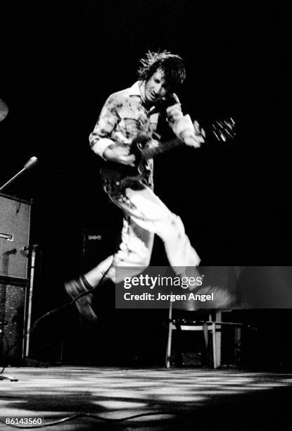 Photo of Pete TOWNSHEND and The Who; Pete Townshend performing live onstage at Falkoner Centret, jumping