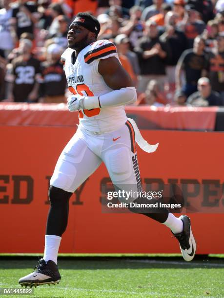 Defensive lineman Emmanuel Ogbah of the Cleveland Browns runs onto the field as he is introduced to the crowd prior to a game on October 8, 2017...