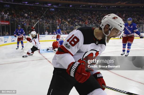 Drew Stafford of the New Jersey Devils scores the game winning goal on the powerplay at 1:00 of the third period against Ondrej Pavelec of the New...