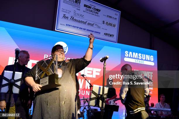 Altons Rooftop Iron Chef Showdown Champion Chef Michael Mignano of Perrine accepts his award onstage the Food Network & Cooking Channel New York...