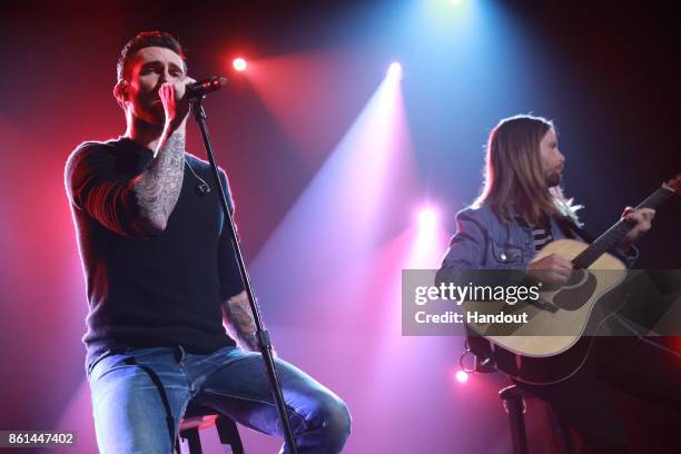 In this handout photo provided by One Voice: Somos Live!, Adam Levine and James Valentine perform onstage during "One Voice: Somos Live! A Concert...