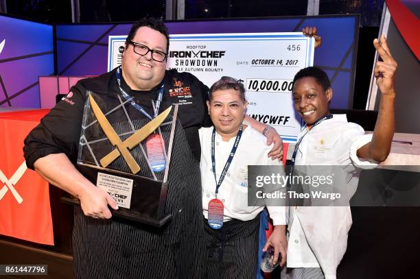 Altons Rooftop Iron Chef Showdown Champion winner Chef Michael Mignano of Perrine poses with his team at the Food Network & Cooking Channel New York...