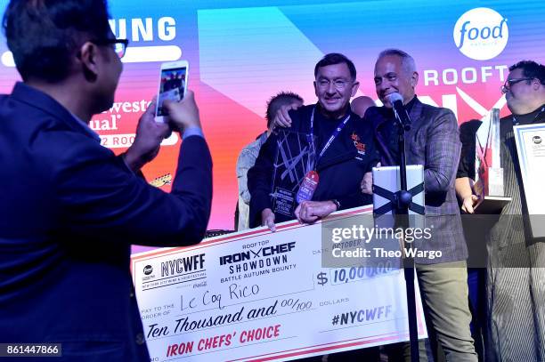 Iron Chefs' Choice winner Antoine Westermann of Le Coq Rico poses with Geoffrey Zakarian the Food Network & Cooking Channel New York City Wine & Food...