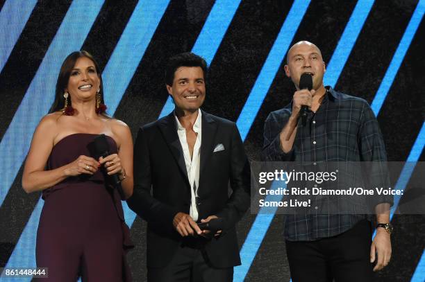 In this handout photo provided by One Voice: Somos Live!, Giselle Blondet, Chayanne and Derek Jeter speak onstage at One Voice: Somos Live! A Concert...