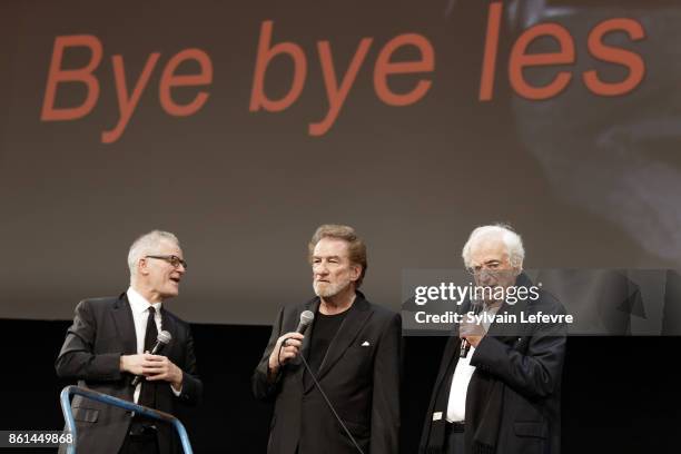 Thierry Fremaux, Eddy Mitchell and Betrand Tavernier attend the opening ceremony of 9th Film Festival Lumiere In Lyon on October 14, 2017 in Lyon,...