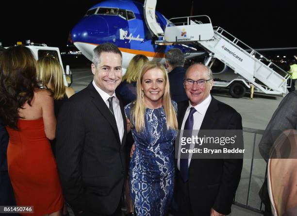 Adam Selkowitz, Melissa Joan Hart and Arthur Selkowitz attend the 2017 Americares Airlift Benefit at Westchester County Airport on October 14, 2017...