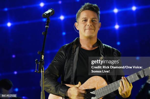 In this handout photo provided by One Voice: Somos Live!, Alejandro Sanz performs onstage at One Voice: Somos Live! A Concert For Disaster Relief at...