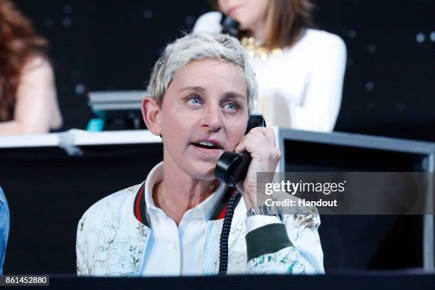 In this handout photo provided by One Voice: Somos Live!, Ellen DeGeneres participates in the phone bank during "One Voice: Somos Live! A Concert For...