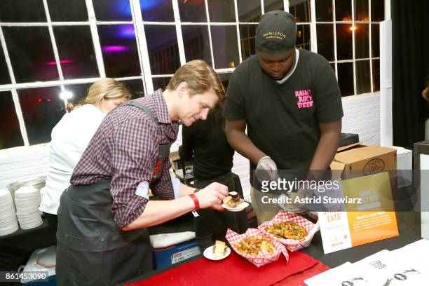 Chef Hank Tibensky and his team prepare his dish, Hank's Juicy Beef, during Street Eats hosted by Ghetto Gastro at Industria on October 14, 2017 in...