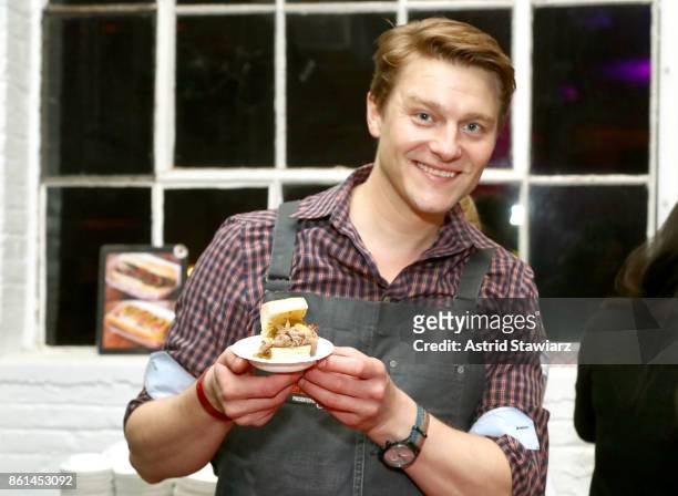 Chef Hank Tibensky poses with his dish, Hank's Juicy Beef, during Street Eats hosted by Ghetto Gastro at Industria on October 14, 2017 in New York...