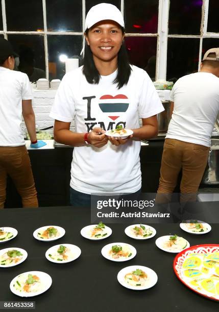 Chef Emorn Jamalee Henshaw, poses with their dish, Khao Man Gai, during Street Eats hosted by Ghetto Gastro at Industria on October 14, 2017 in New...