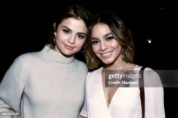 In this handout photo provided by One Voice: Somos Live!, Selena Gomez and Vanessa Hudgens participate in the phone bank during "One Voice: Somos...