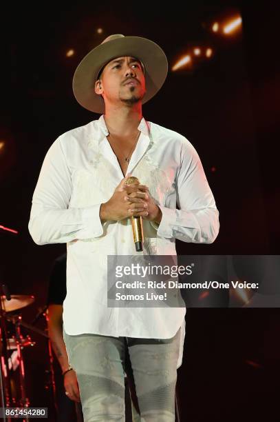 In this handout photo provided by One Voice: Somos Live!, Romeo Santos performs onstage at One Voice: Somos Live! A Concert For Disaster Relief at...