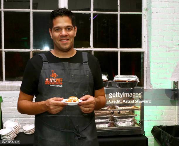 Chef Ariel Rodriguez poses with his signature empanadas during Street Eats hosted by Ghetto Gastro at Industria on October 14, 2017 in New York City.