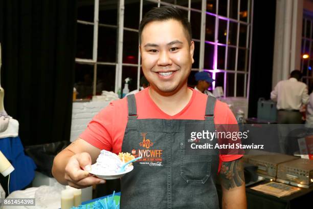 Chef Tony Quach poses with his dish, Blueberry Shaved Cream, during Street Eats hosted by Ghetto Gastro at Industria on October 14, 2017 in New York...