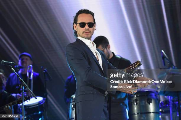 In this handout photo provided by One Voice: Somos Live!, Marc Anthony performs onstage at One Voice: Somos Live! A Concert For Disaster Relief at...