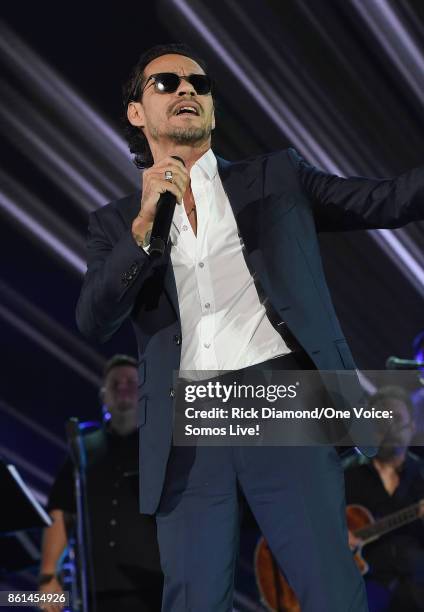 In this handout photo provided by One Voice: Somos Live!, Marc Anthony performs onstage at One Voice: Somos Live! A Concert For Disaster Relief at...